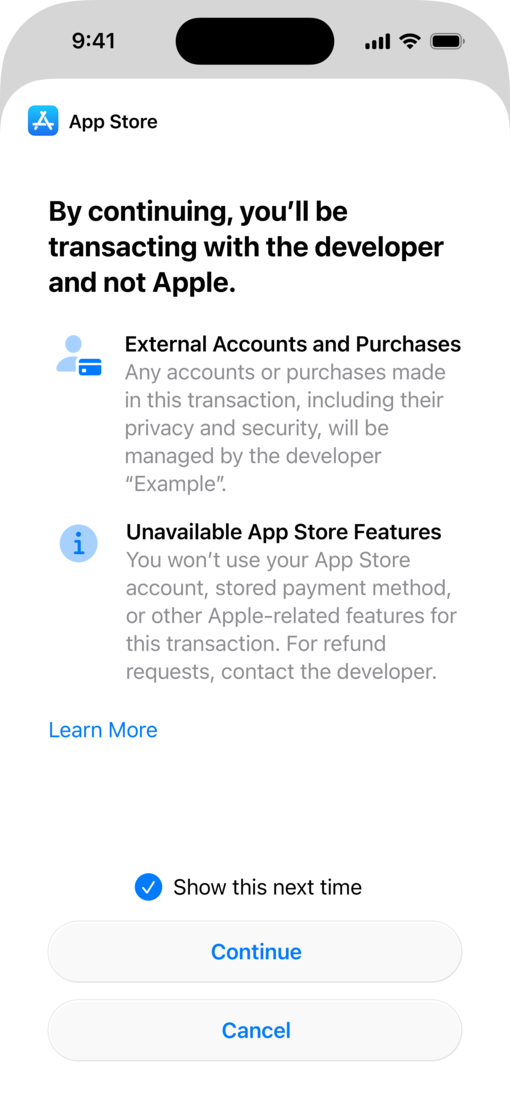 iPhone 屏幕显示了系统提供的用于替代 App 内付款处理的披露弹窗